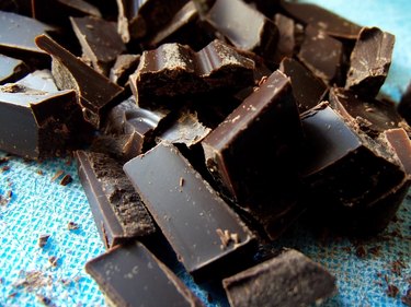 Chopped Dark Chocolate on Blue Cutting Board