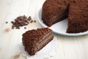 Homemade chocolate blackout cake with a cut piece