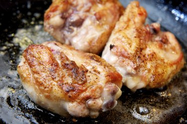 Chicken Thighs frying