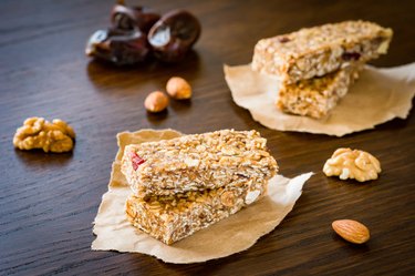 Granola bars or energy bars on brown background