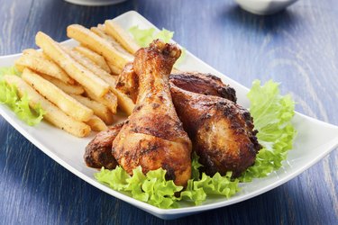 Chicken drumsticks with french fries