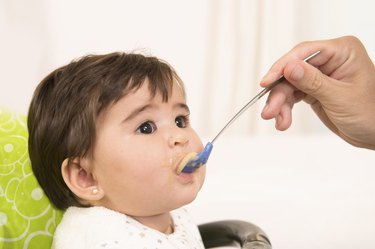 Feeding cute Lovely Baby Girl