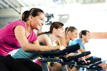 Indoor bycicle cycling in gym