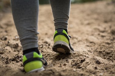 Close-up of runner's legs