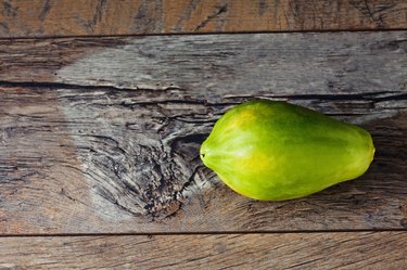 Papaya on wood