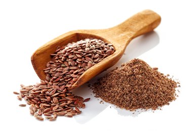Flax seeds on a white background