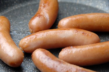 Sausage on frying pan