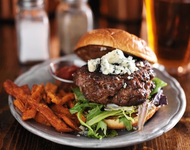 thick burger with blue cheese and sweet potato fries