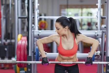 Sport woman exercising gym, fitness center