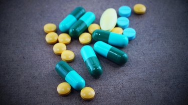 drug,pill and medical on wood background in vintage