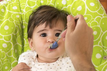 Feeding a cute Lovely Baby Girl