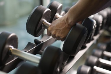 Man Lifting Dumbbells