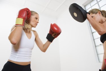 Boxer practicing with sparring partner