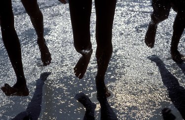 Legs splashing in water