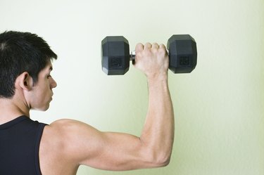 Man lifting dumbbell