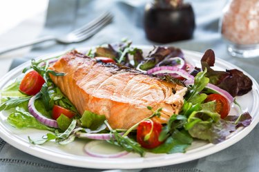 Salmon steak with salad