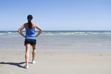Woman exercising on a beach