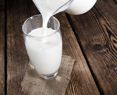 Milk on a dark wooden background