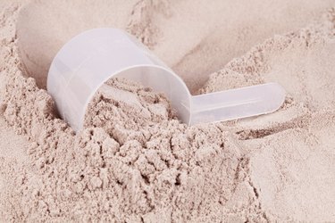 Scoop of chocolate whey isolate protein