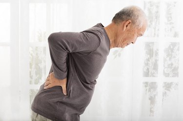 senior man with Pain in back