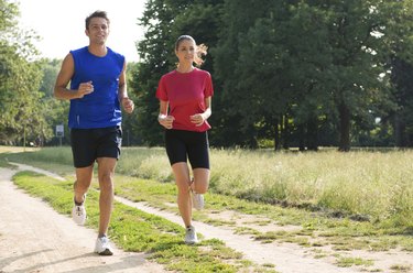 Portrait Of Young Couple Jogging