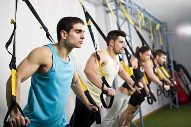 People traiing in elastic rope