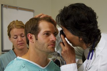 doctor doing eye examination
