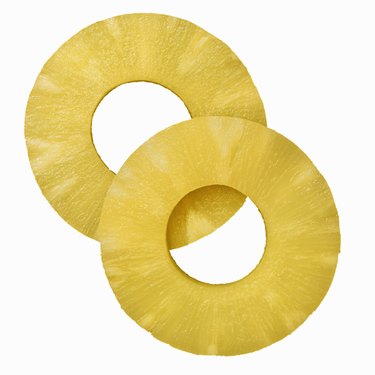 Close-up of two segments of pineapple