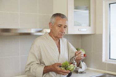 Man eating salad