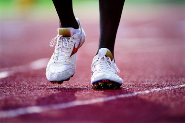 Feet of runner on track