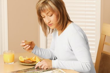 Woman eating breakfast