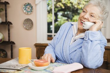 Senior woman talking on telephone