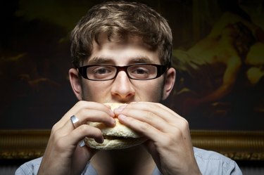 Man eating burger