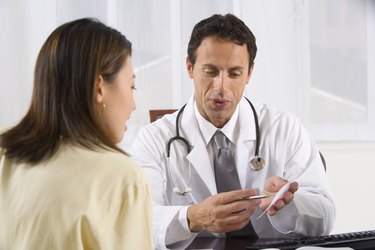 Doctor talking to patient