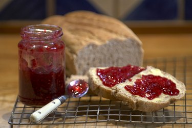 Strawberry jam on crust of bread