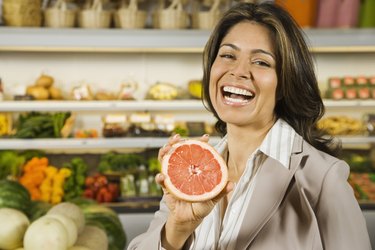 Hispanic woman shopping in grocery store