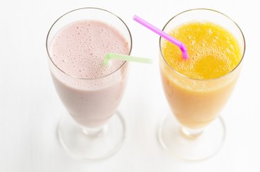 Strawberry and orange smoothie, studio shot