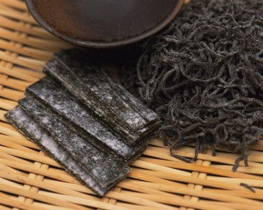 Closed Up Image of Some Dried Seaweed on a Wooden Surface, High Angle View