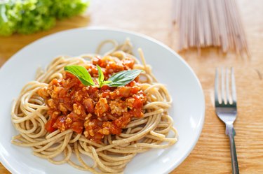 A plate with spaghetti and bolognese sauce