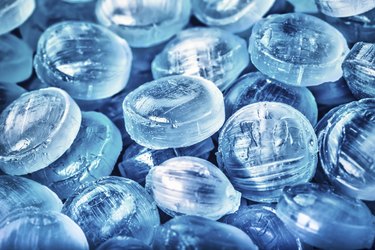Blue abstract background or texture of sweets and menthol candies