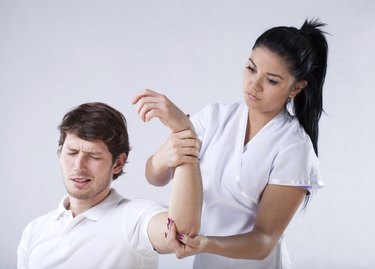 Physiotherapist with patient