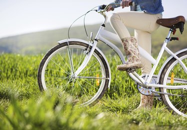 Detial of young woman with bike