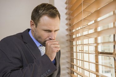 Businessman looking out the window