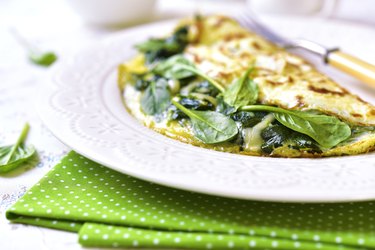 Omelette stuffed with spinach and cheese.