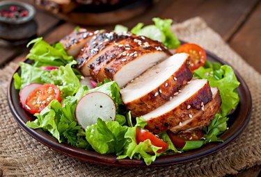 Fresh vegetable salad with grilled chicken breast