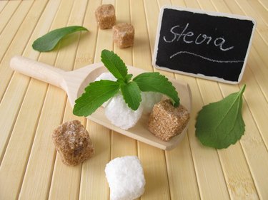 Sugar cubes and stevia with nameplate