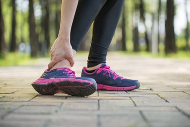 woman runner hold twisted ankle Pain ,Human Leg