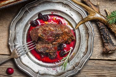 Venison served with cranberry sauce
