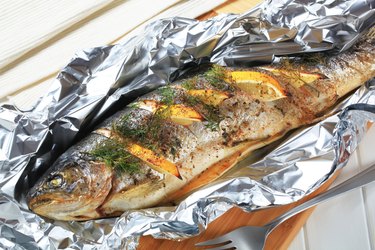 Baked trout with lemon and dill.