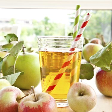 Apple juice and fresh apples